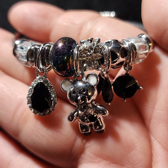 STAINLESS STEEL TWIST CHARM BRACELET - Picture 1 of 6